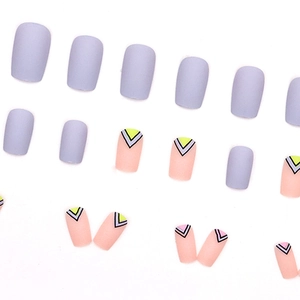 Short square lilac and matte pink press-on nails with geometric V-shape french design