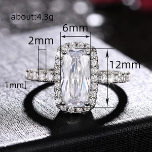 Zilveren halo ring met 6x12mm rechthoekige zirkoon en pavé-accenten van 4,3g