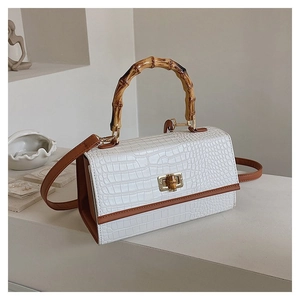 Retro white crocodile pattern handbag with bamboo handle and brown leather trim strap