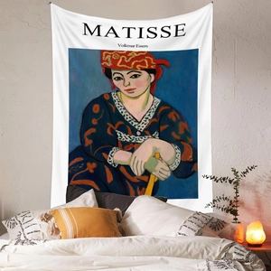 Artistic Henri Matisse tapestry featuring vibrant colors displayed on a white bedroom wall