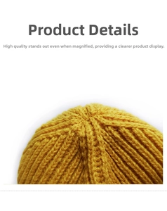 Detail shot of yellow knit beanie crown showing high-quality stitching and rib texture
