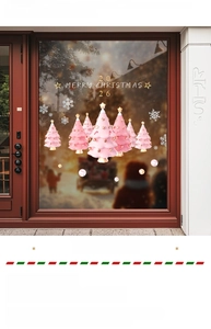 Pink Christmas tree window decals with white snowflakes and Merry Christmas lettering
