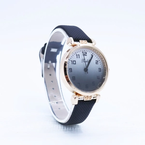 Women's minimalist quartz watch with gradient dial and rose gold case on black leather strap
