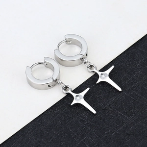 Detailed view of silver polished stainless steel hoop earrings with star pendants