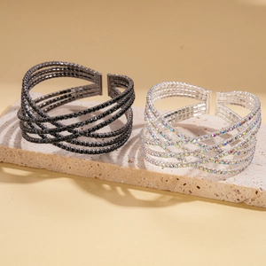 Three-layer geometric cross open bangle with rhinestones in black and silver finishes