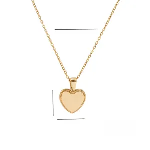 Detail showing 18K gold heart necklace dimensions 16mm x 16mm and 450mm chain length