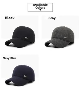 Close-up of winter men's wool baseball caps in black, grey, and navy blue colors