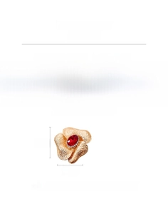 Detail of vintage flower brooch with red rhinestone center and precise 5.5cm dimensions