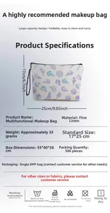 Detail view of linen seashell pouch showing 17x25cm dimensions and seaside pattern