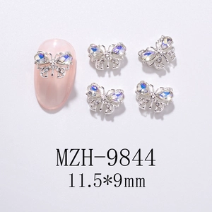 Detailed view of silver butterfly nail charms with AB rhinestones, size 11.5x9mm