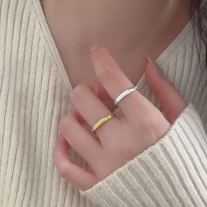 Minimalist 925 sterling silver twill ring set in gold and silver finish worn on fingers