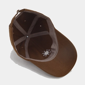 Brown corduroy baseball cap with sun embroidery showing detailed inner structure and sweatband
