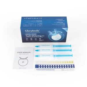GlorySmile teeth whitening kit including LED device, gel pens, and professional color guide