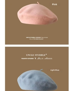 Classic pink and light blue wool beret hats with soft texture and top detail