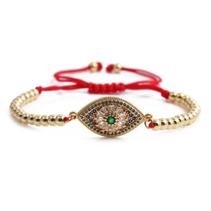 Adjustable evil eye bracelet with gold beads, green zircon and red braided rope cord