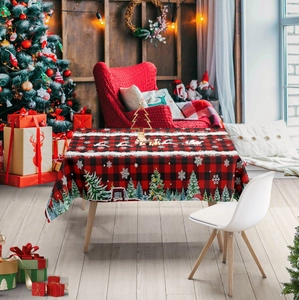 Festive red and black plaid Christmas tablecloth featuring reindeer and snowflakes pattern