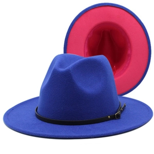 Detail of blue wool fedora with red lining, black belt buckle, and wide flat brim