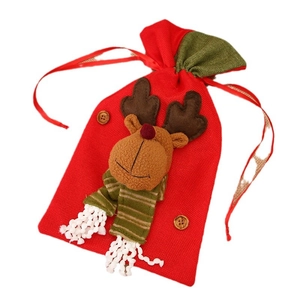 Christmas gift bag with 3D reindeer design and red drawstring for holiday candy