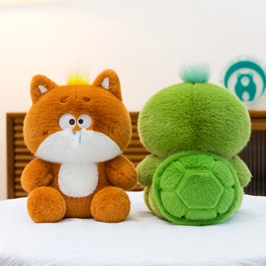Cute plush stuffed fox and funny turtle toys sitting on a soft surface for kids decor