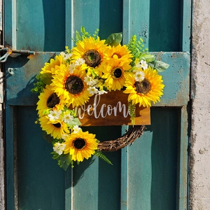 Couronne de tournesols avec panneau welcome en bois pour décoration de porte