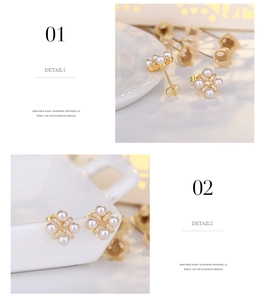 Detail view of flower-shaped earrings with white pearls and sparkling zircons