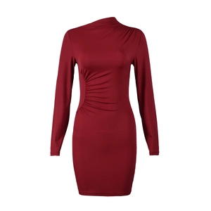 Detailed view of elegant wine red long sleeve dress featuring ruched waist and pleated neck