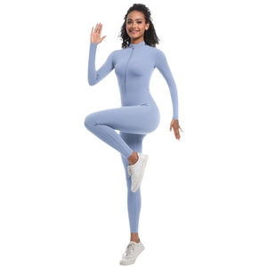 Combinaison de yoga moulante bleu clair à manches longues avec fermeture éclair frontale