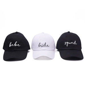 Detailed embroidery on baseball caps featuring Babe Bride and Squad wedding party designs