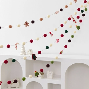Handmade Christmas wool felt ball garland with Santa and Gingerbread Man ornaments