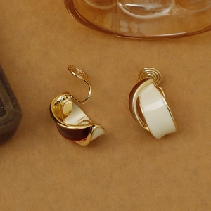 French vintage enamel clip-on earrings with gold-tone metal and pearl luster finish