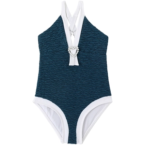 Detail of teal seersucker girls swimsuit with white trim and heart pearl ornament
