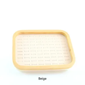 Beige velvet ring display tray with 100 slots in natural bamboo wood frame for jewelry