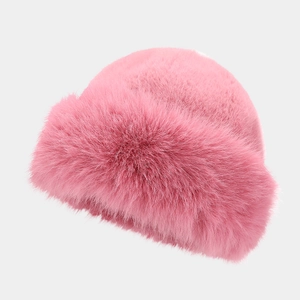 Winter plush bucket hat in bright pink faux rabbit fur for women outdoor warmth