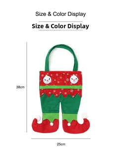 Detail showing Christmas elf candy bag dimensions with 38cm height and snowman design