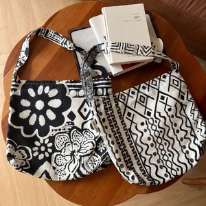 Bohemian linen shoulder bag with floral and geometric prints in a lifestyle setting