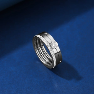 Detailed view of luxury titanium steel three-piece ring set with round-cut zircon stones