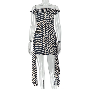 Detail of animal print mini dress showing the off-the-shoulder neckline and bodycon fit