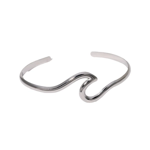 Minimalist silver wavy titanium steel open bangle with a polished metallic finish