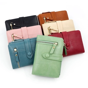 Short PU leather trifold wallets for women featuring buckle and zipper in seven colors