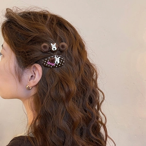 Brown flocking polka dot hair clip set with cute puppy design on model's side hair