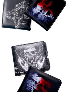 Detail of assorted vintage skull print short wallets in black leather-like material