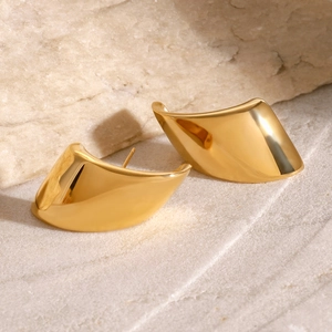 Polished 18k gold plated stainless steel geometric earrings on beige stone base