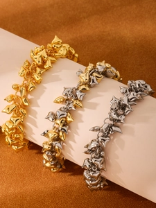 Detailed display of heart bead bracelets in gold, silver, and two-tone finishes