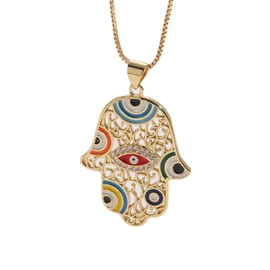 Gold Hamsa Hand necklace with evil eye pendant and zircon stones on white background