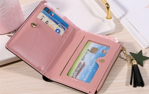 Pink PU leather bifold wallet featuring multiple card slots and tassel star pendant