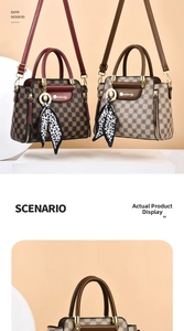 Detailed view of checkered handbags with silk scarf charms and golden hardware accessories