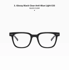 Detail of square black frame sunglasses with clear anti-blue light lenses and silver studs