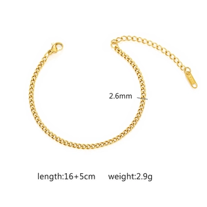 Detail of 2.6mm gold stainless steel wheat chain bracelet with lobster clasp and tag