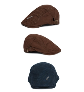 Detail of adjustable metal buckle and Sports emblem on retro cotton flat caps