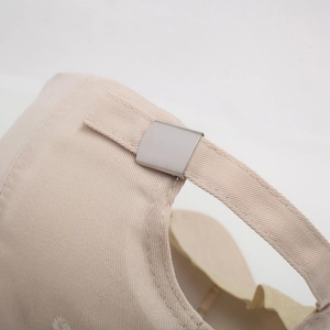 Classic cotton khaki baseball cap featuring an adjustable silver metal slider buckle
